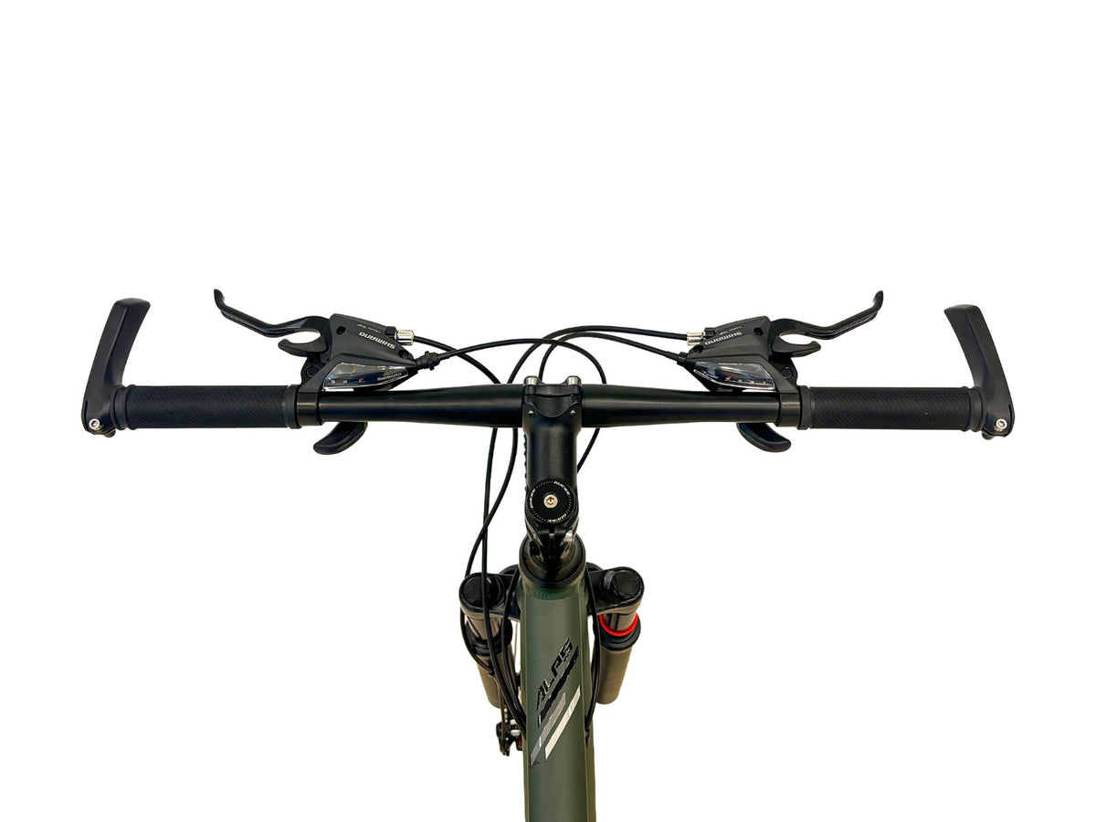 Experience the perfect combination of style, strength, and performance with this sleek green mountain bike. Featuring a sturdy frame, powerful front suspension, wide Kenda tires, and front and rear disc brakes, it’s designed for smooth handling and reli
