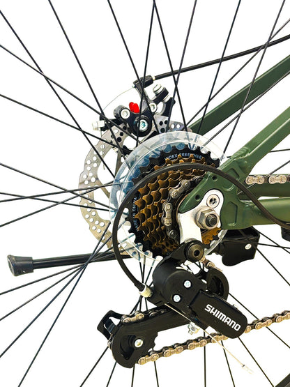 Experience the perfect combination of style, strength, and performance with this sleek green mountain bike. Featuring a sturdy frame, powerful front suspension, wide Kenda tires, and front and rear disc brakes, it’s designed for smooth handling and reli